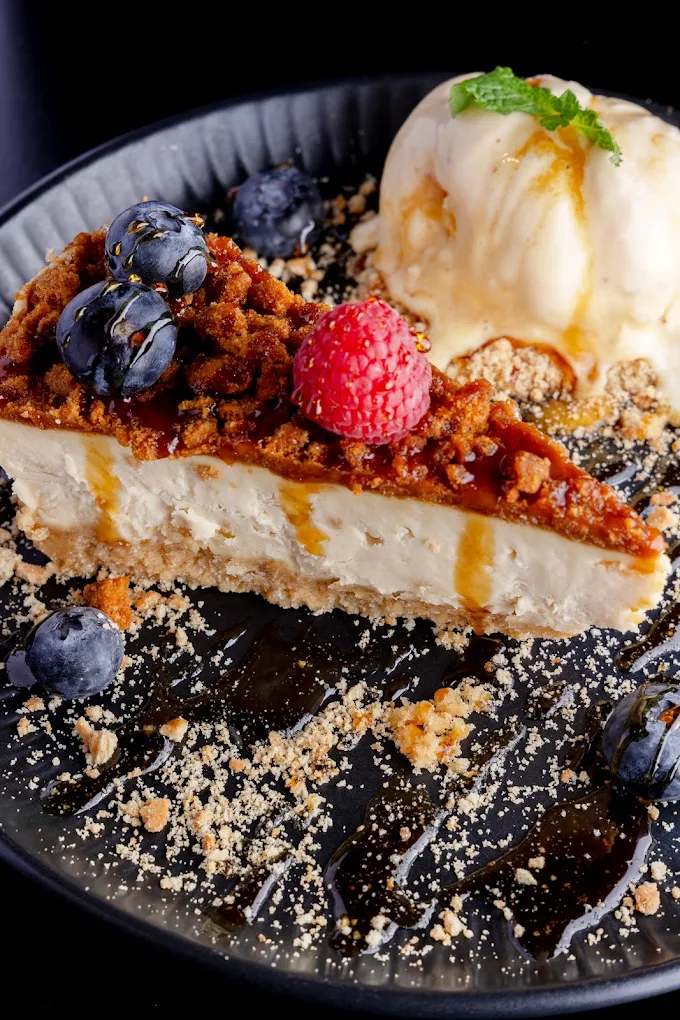 Cheesecake dessert served with berries at Onyx